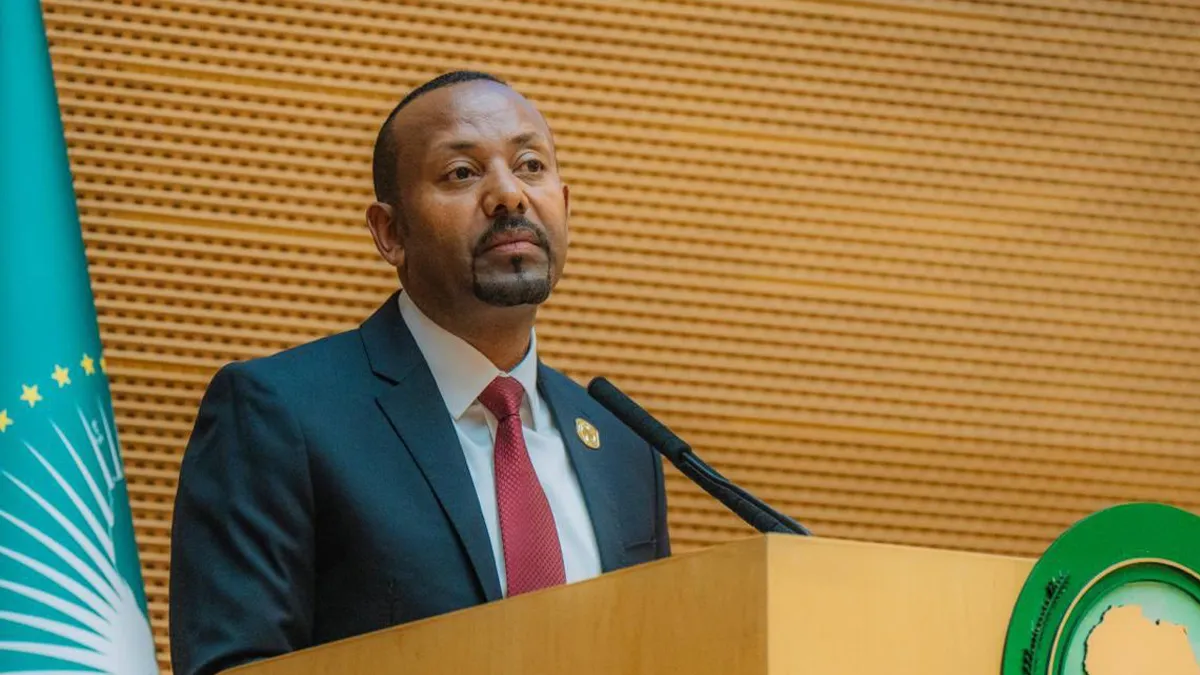 Prime Minister Abiy Ahmed delivering a speech on Ethiopia's maritime access and digital transformation at the African Union Summit in Addis Ababa.